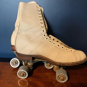 Antique Leather Roller Skates with Metal Wheels